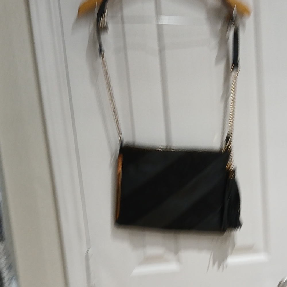 Sleek Black Crossbody Bag Size 0S.